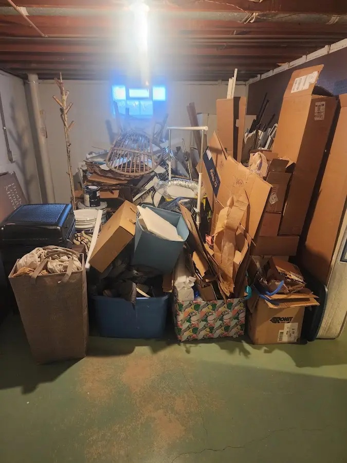 Roll-off dumpster container at job site for 8 Yard Dumpster Rental in Sandy Oaks